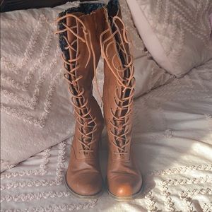 Tall lace up boots